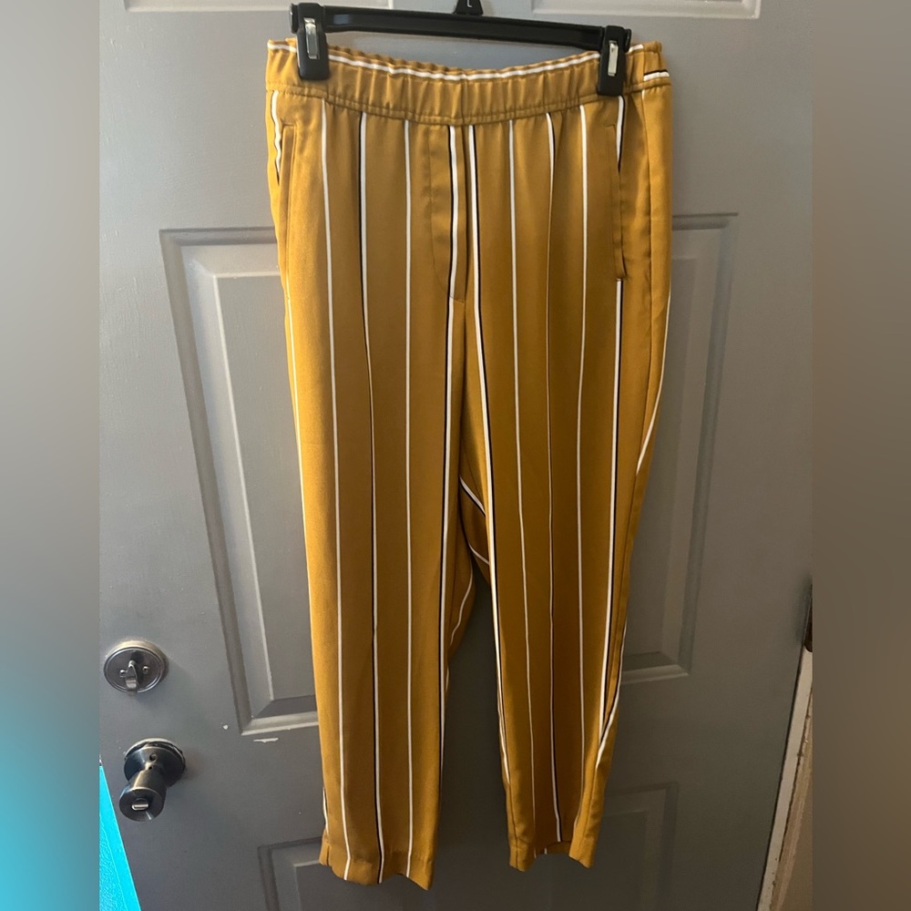 Dress capris mustard yellow with brown and white stripes. Size 6. H&M